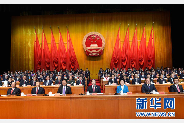 10月1日，慶祝中華人民共和國成立66周年暨新疆維吾爾自治區(qū)成立60周年大會在新疆人民會堂隆重舉行。 新華社記者 饒愛民 攝