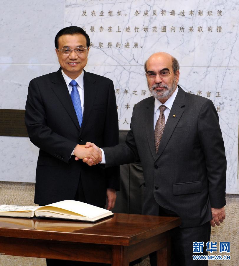 10月15日，中國國務院總理李克強在羅馬會見聯(lián)合國糧農組織總干事格拉齊亞諾。 新華社記者 饒愛民 攝