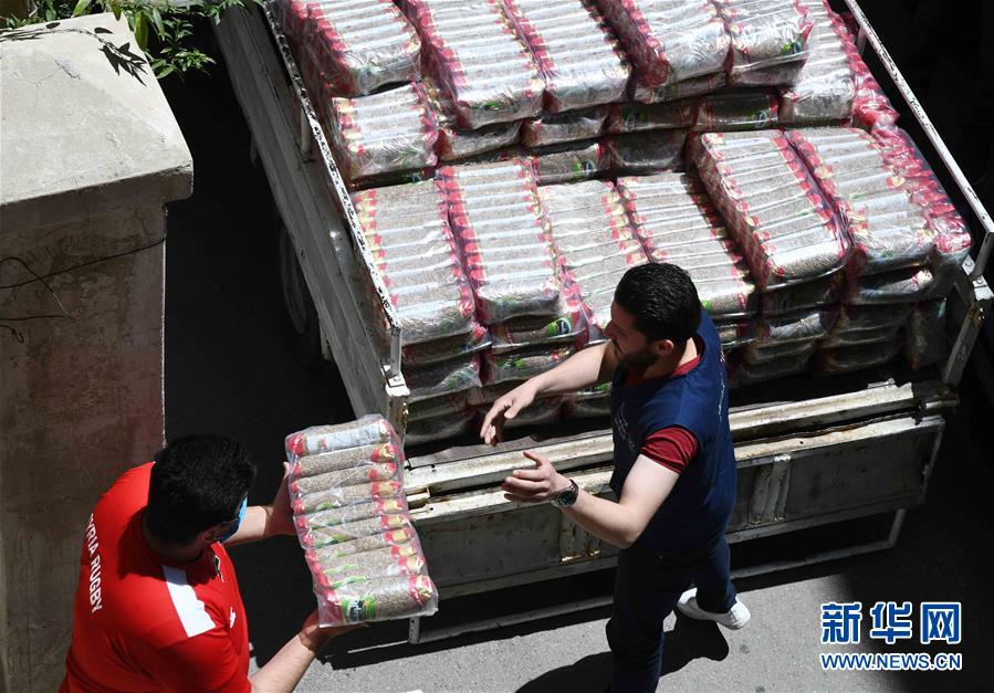 （國際疫情&middot;圖文互動(dòng)）（1）通訊：疫情中，那抹笑容最難忘&mdash;&mdash;記向困難家庭發(fā)放愛心包裹的敘利亞青年志愿者